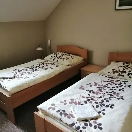 Pensionat U Kostela *